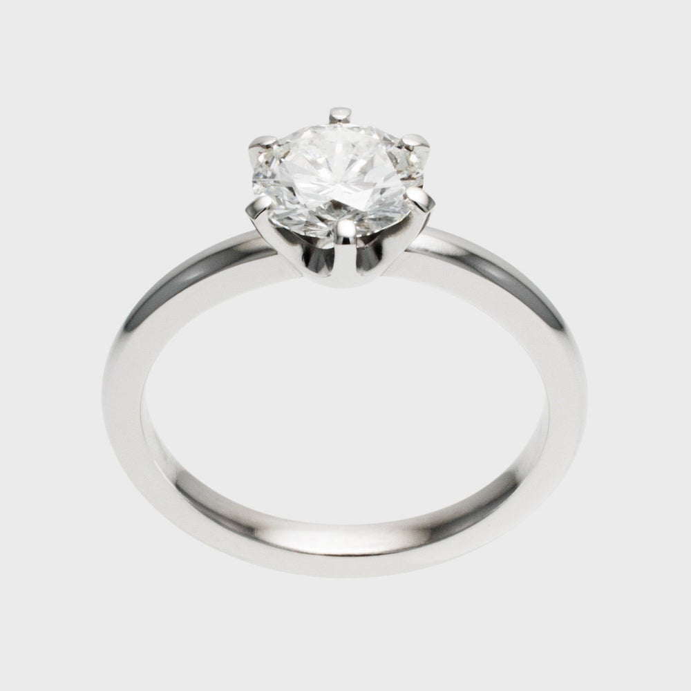 White gold solitaire engagement ring, upright front view, by RINGKING Max Grün