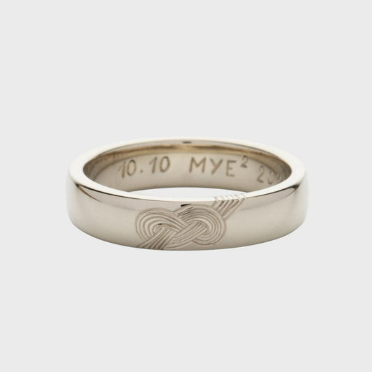 Handgefertigte Eheringe mit Gordischer Knoten Gravur | RINGKING Max Grün, Goldschmied Wien